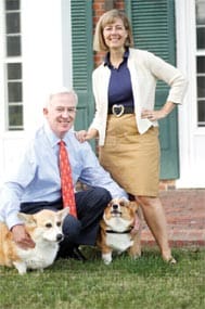 Lexi Laccetti Byers ’78 and husband Jeb with corgis Lily and Ted.