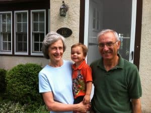 Robin Spence Costa ’65 with her grandson and husband, Dominic