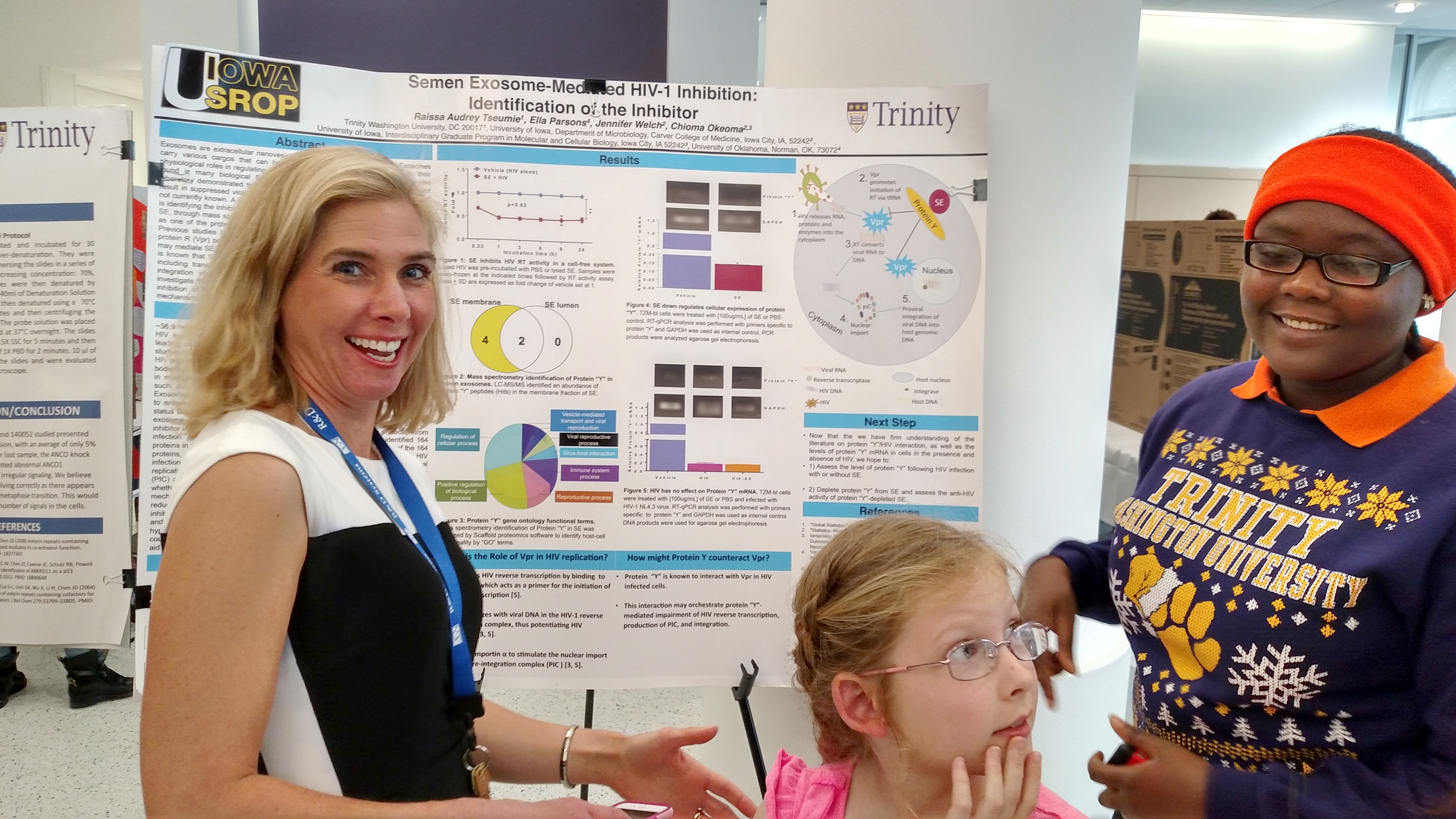 Dr. DeBoy and Audrey Tseume discuss science poster