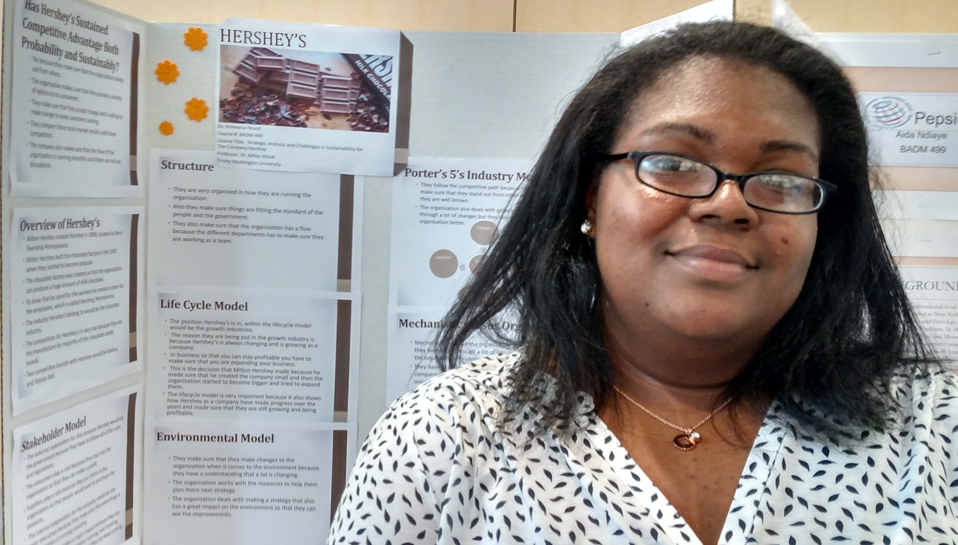 Knewana Heard presents her poster on the Hershey Company