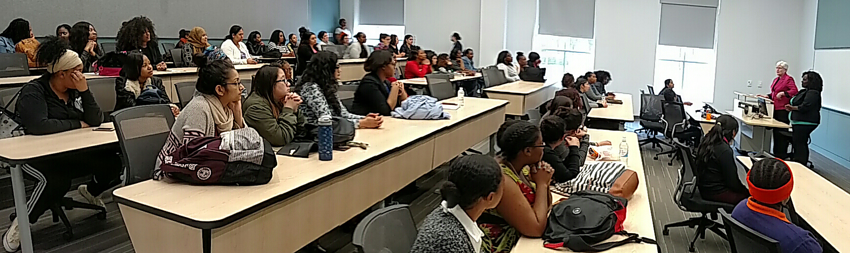 Students listen to speaker