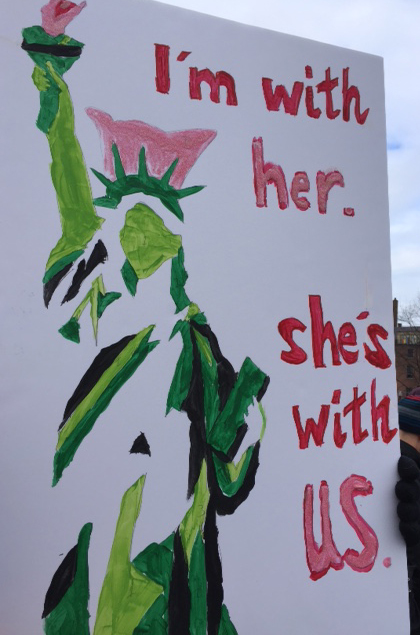 Placard at women's march statue of liberty