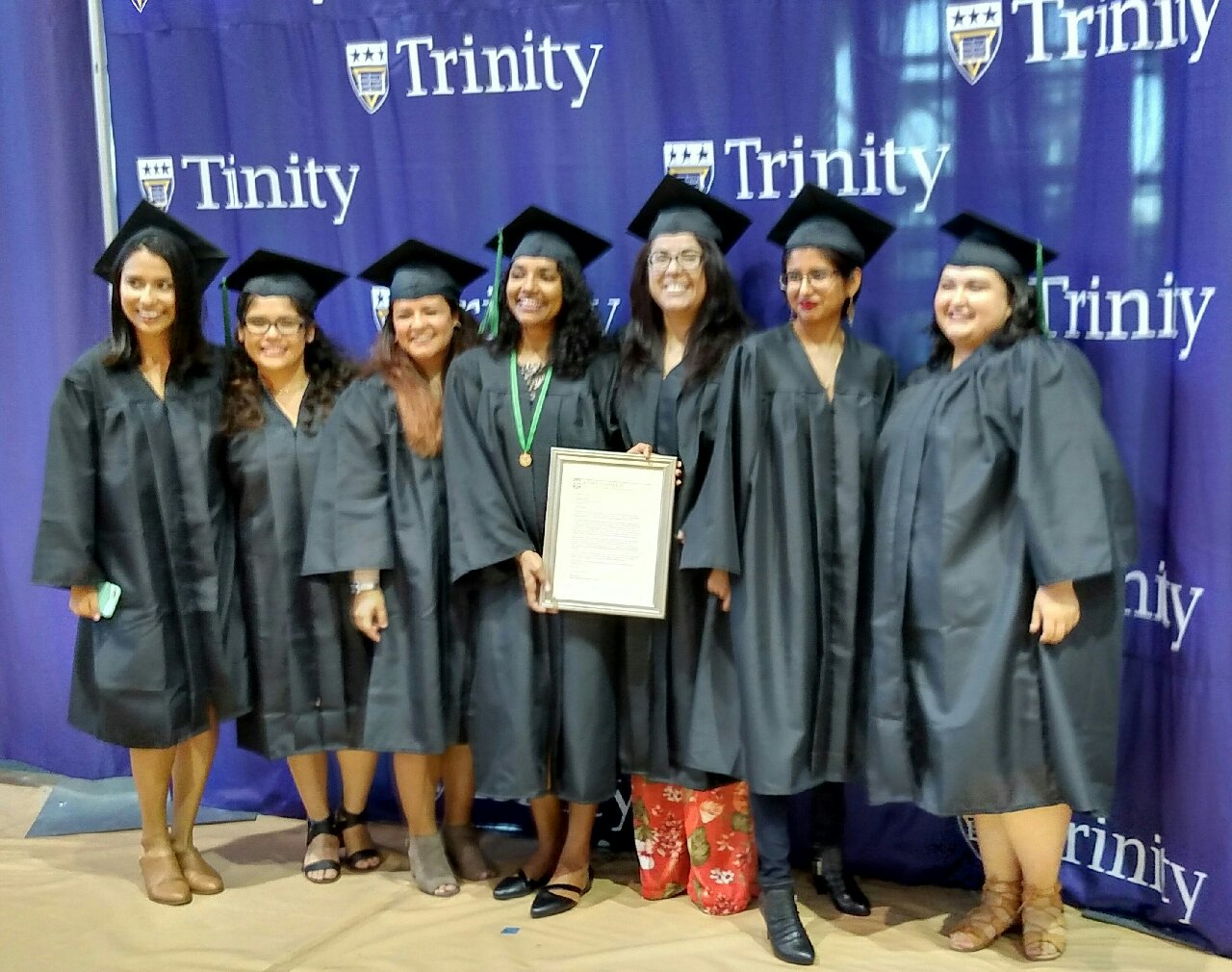 seniors at cap and gown cerremony