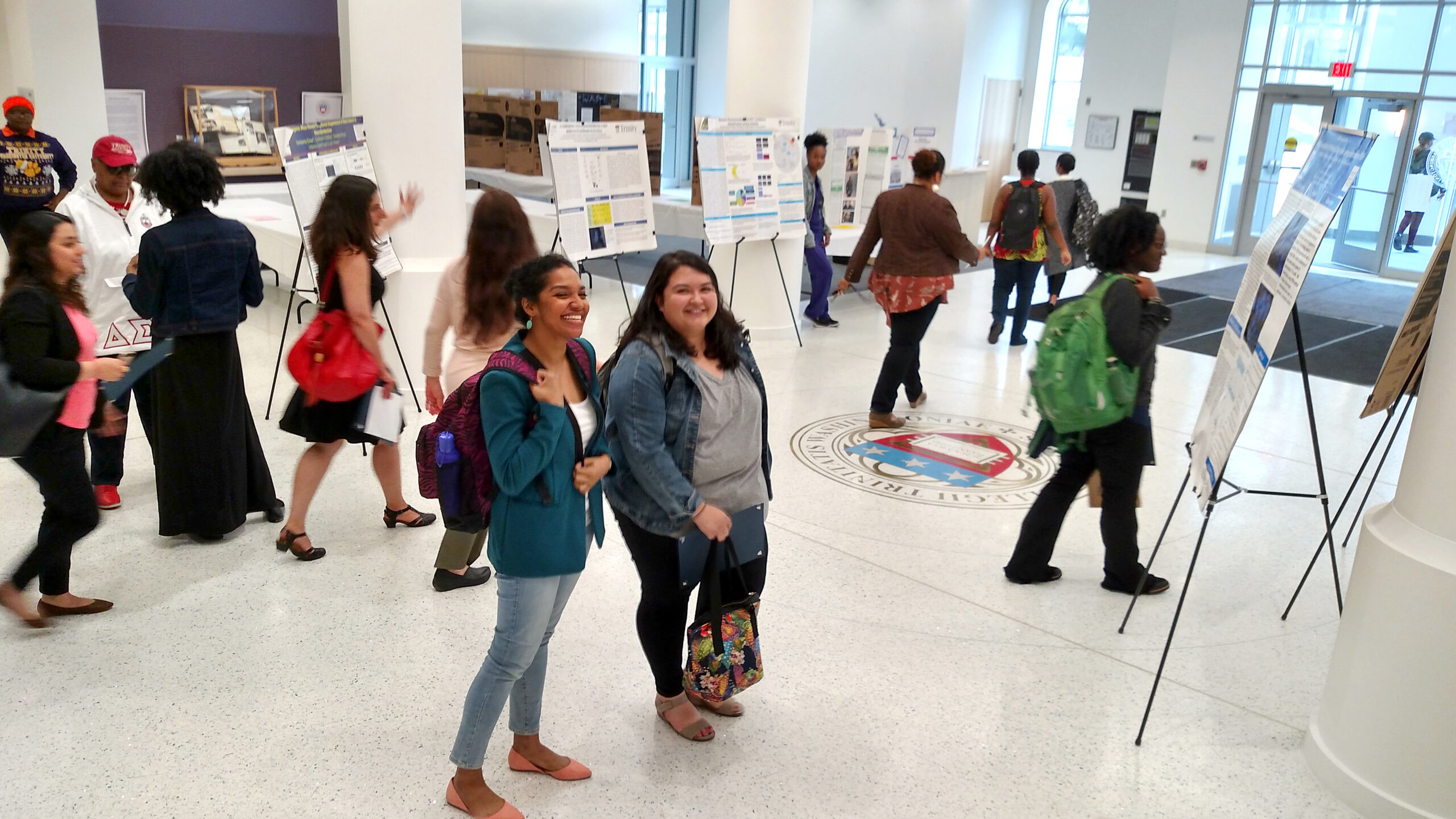 Students walking through Payden Center lobby